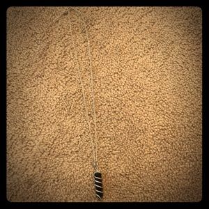 Black hematite crystal on a sliver chain